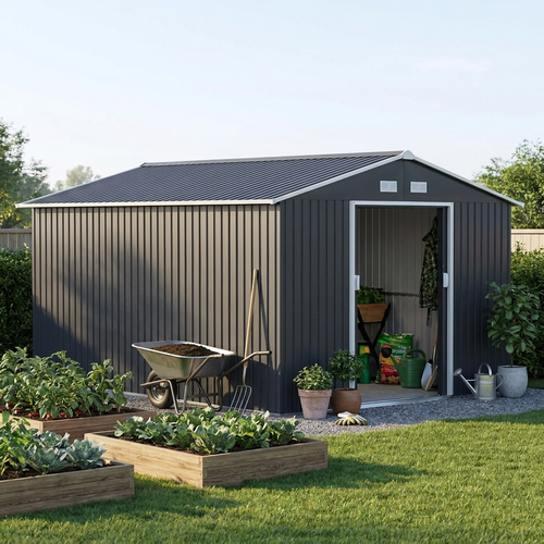 Steadrow metal shed on a gravel pad beside raised vegetable beds